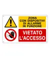 Cartello multisimbolo 'zona con dispositivi di allarme in funzione...'
