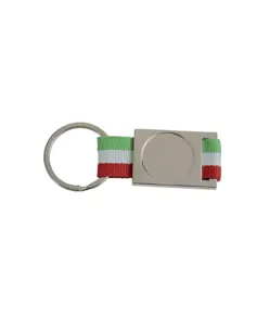 Portachiavi in alluminio/nylon. Spazio centrale idoneo per logo resina