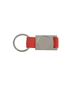 Portachiavi in alluminio/nylon. Spazio centrale idoneo per logo resina