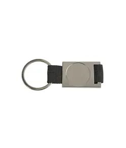Portachiavi in alluminio/nylon. Spazio centrale idoneo per logo resina