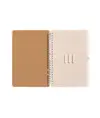 Quaderno ad anelli in sughero trasformabile in stand portacellulare.
