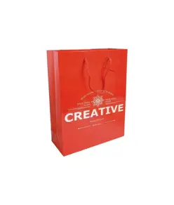 Shopper con soffietto in carta laminata 157 g/m2 con rinforzo alla base Handle