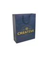 Shopper con soffietto in carta laminata opaca 157 g/m2 con rinforzo alla base Handle Shopper con soffietto in carta laminata opaca 157 g/m2 con rinforzo alla base Handle