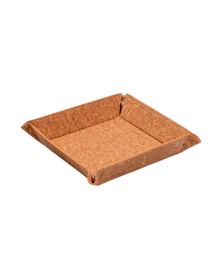 Svuotatasche in sughero con bottoni automatici.