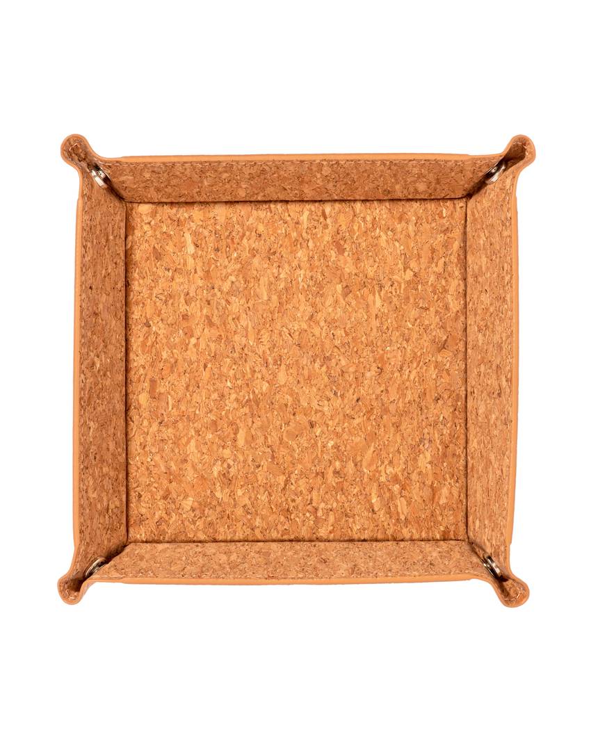 Svuotatasche in sughero con bottoni automatici.